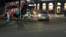 Campaigners form human chain to block vehicles flouting rules at Edinburgh junction - Videoclip.bg